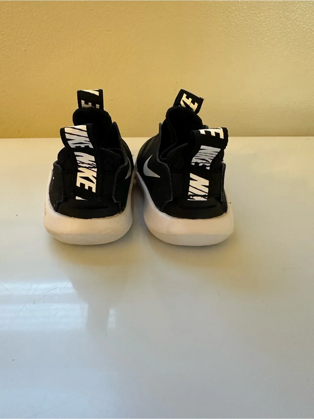 Nike Kids Black & White Slip-On Athletic Sneakers